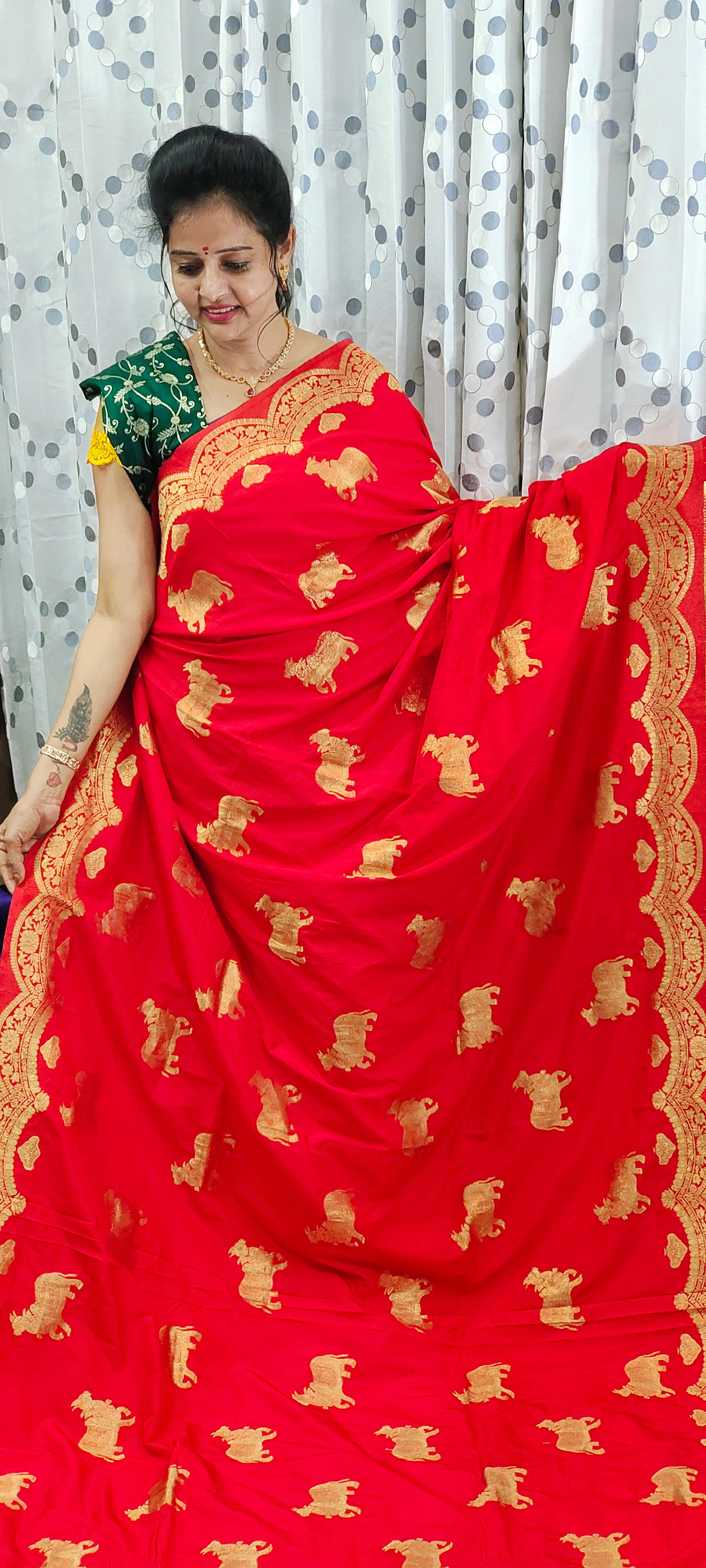 Bright Rani Red with rich Golden Zari Weaving